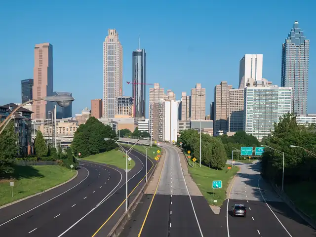 Atlanta skyline from the Jackson Street Bridge. Flights from Atlanta to Detroit