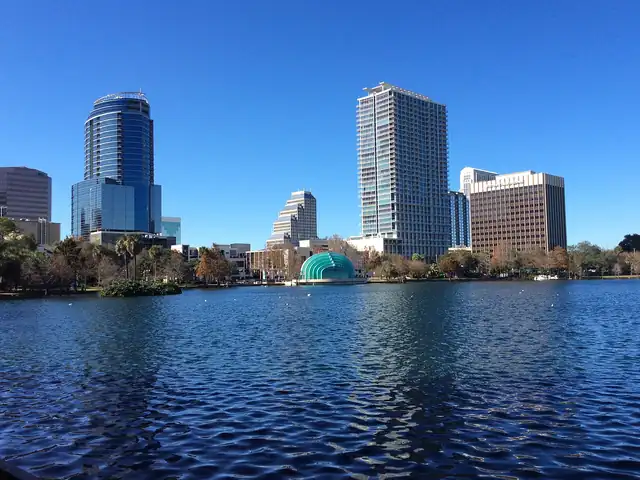 Downtown Orlando towers across Lake Eola