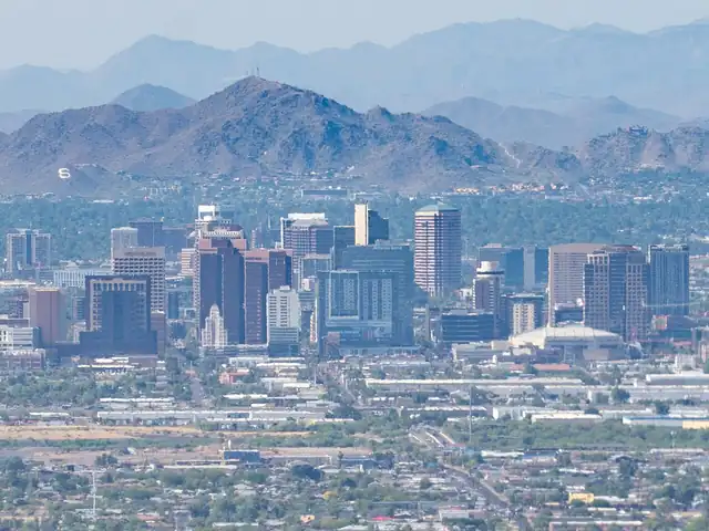 Downtown Phoenix skyline with the desert mountains behind