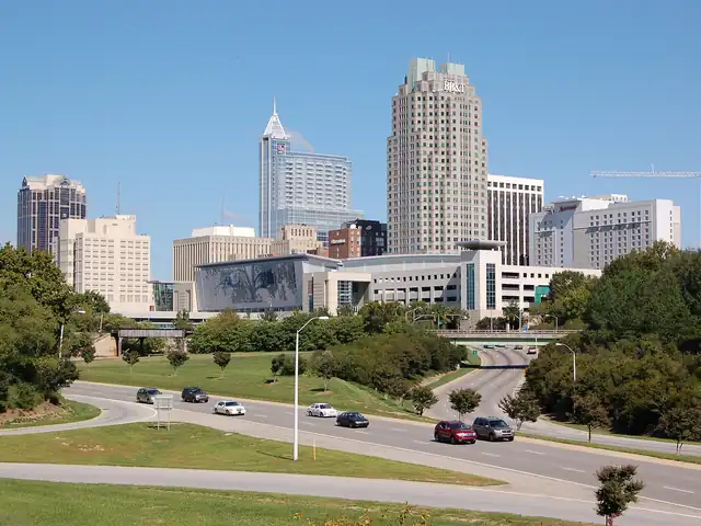 Downtown Raleigh skyline from Western Boulevard. Flights from Raleigh to New York